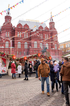 Russia, Moscow: â March 01, 2020: Moscow Maslenitsa Festival. Traditional national celebration in russian folk style. Holiday decor, market, fair at Manezhnaya Square.のeditorial素材