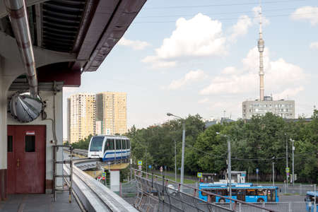 Russia, Moscow - June 27, 2020: Moscow monorail railway station "Timiryazevskaya". Monorail railway station, a line of public urban transport. Departure of the train from the station in the direction of VDNH.のeditorial素材