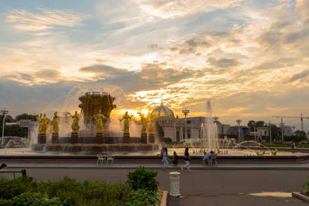 Russia, Moscow, September.09 2020: Fountain "Friendship of Peoples" at the VDNKh Park. Sunset, evening of a summer day.のeditorial素材