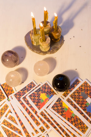 Russia, Moscow, June 11, 2021. Tarot cards on a wooden table. Magical rituals. Illustrative editorial.のeditorial素材