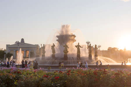 Russia, Moscow, July.20 2020: Fountain "Friendship of Peoples" at the VDNKh Park. Sunset, evening of a summer day.のeditorial素材