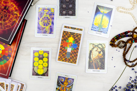 Russia, Moscow, June 11, 2021: Tarot Setup Background. Tarot cards, candles, for divination or a...
