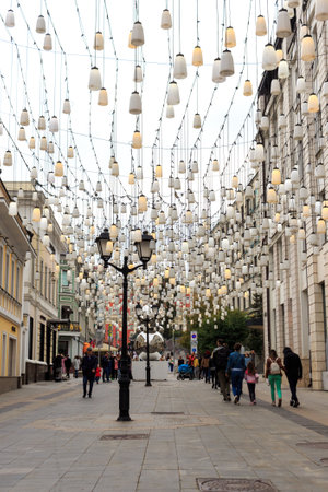 Moscow, Russia, Stoleshnikov lane. People walk along a pedestrian street.のeditorial素材
