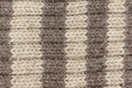 Cozy knitted socks and skeins. Close-up.