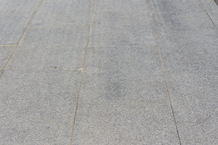 black paving slabs on a city street, backgroundの写真素材