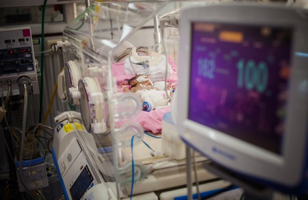 Monitor children in the incubatorsの写真素材