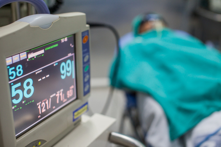 Patient with modern vital sign monitor.の写真素材