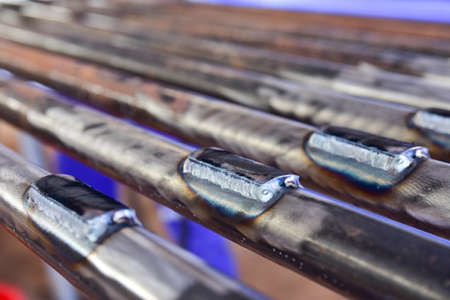 Closeup the connection between the plate and the pipe welding by Tungsten Inert Gas Welding process (TIG). の写真素材