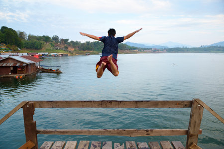 ็็He jump form bridge.の写真素材