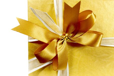 gift box gold colour  isolatedの写真素材