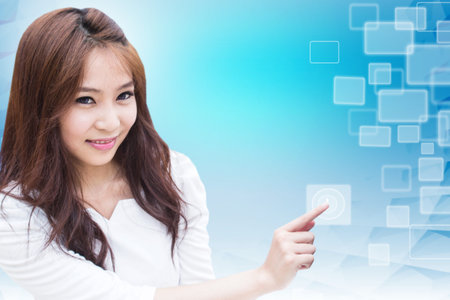 Smart Asian Girl With Touch Screenの写真素材