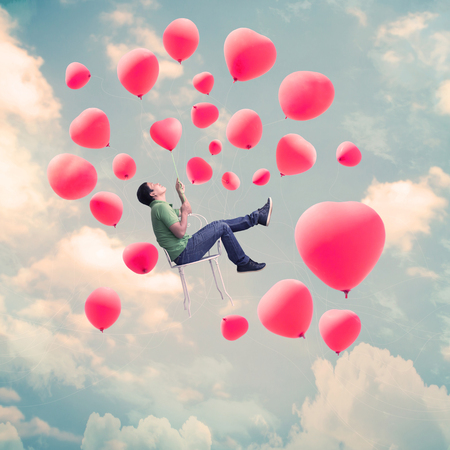 Man With Heart Balloons,Valentines Day Backgroundの写真素材