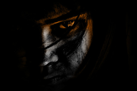 Portrait of scary girl staring at camerasの写真素材