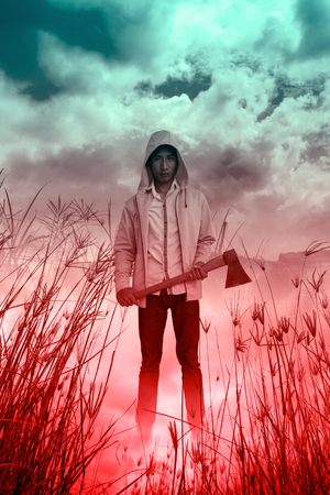 Serial killer with hatchet,Scary background for book cover ideasの写真素材