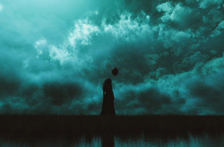 Ghost woman or ghost bride with balloon standing alone in grass field at night,3d illustrationの写真素材