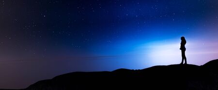 Woman on top of the cliff,3d renderingの写真素材