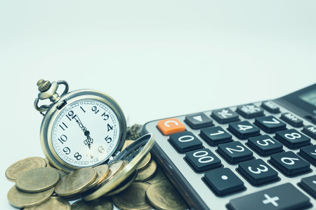Finance and banking concept. Close up coins and calculator. For business and financial background.の写真素材