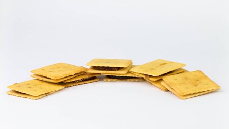 Closeup biscuits stuffed with pineapple jam. The picture has a space beside the object and has a white background.の写真素材
