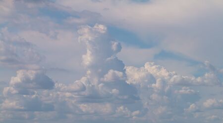 Sky blue On a clear day the air is cloudy and the clouds are beautiful and the clouds have a strange shape. The image is partially clear.の写真素材