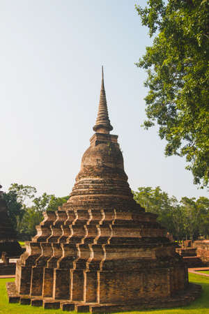 Ancient history Within the Sukhothai Historical Park In the orange sky in the evening Sukhothai, Thailandの写真素材