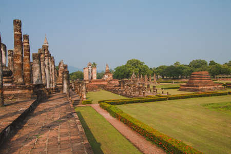 Ancient history Within the Sukhothai Historical Park In the orange sky in the evening Sukhothai, Thailandの写真素材