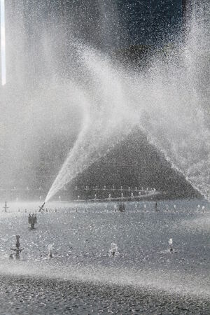 Spray water effect with city backgroundの写真素材