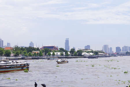 Local transport boat on Chao Phraya River in Bangkok, Thailandの写真素材