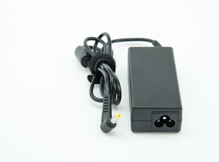 laptop (notebook) AC adapter isolated on white backgroundの写真素材