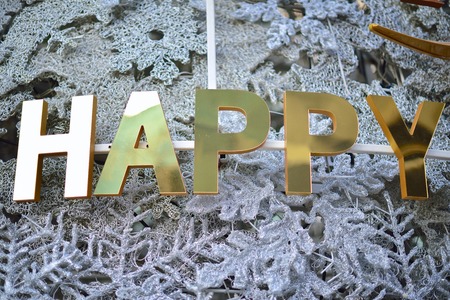 Golden HAPPY word decorationの写真素材