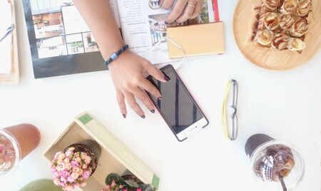 people using smartphoneの写真素材