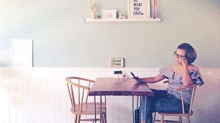 women sit relax in living roomの写真素材