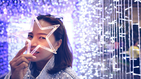 happy emotion. model women peeps through Led flash star shape