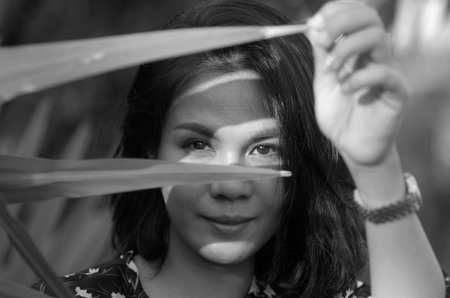 Fashion eye and smile of Thailand lady in art photo black and white