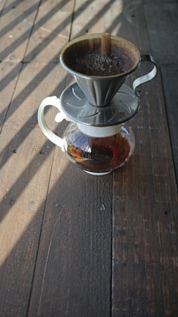 Drip coffee by using coffee beans in the cafe