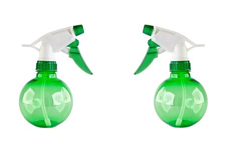 two green plastic water spray bottle isolated on white background の写真素材