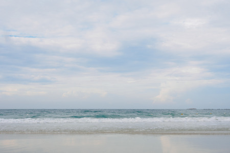 Beach with blue sea and sky backgroundの写真素材