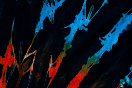 Orange and Blue tie dye abstract texture, Colorful tie dye abstract pattern on black fabric...