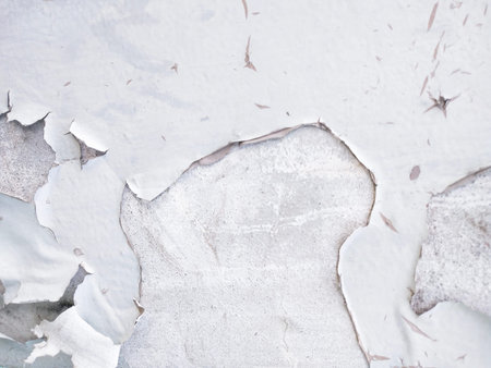 Peeling paint of old wall