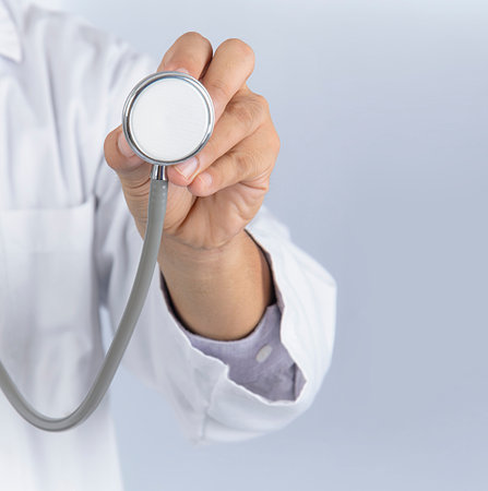 Doctor holding stethoscopeの写真素材