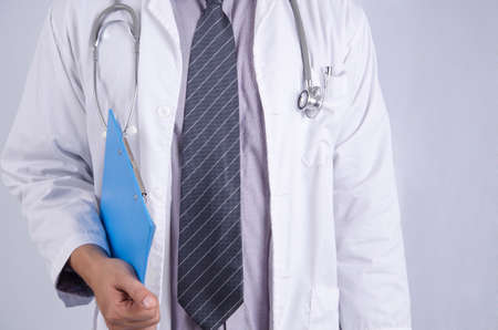 The doctor was holding the boardの写真素材