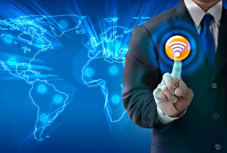 Close up businessman touching on media screenの写真素材