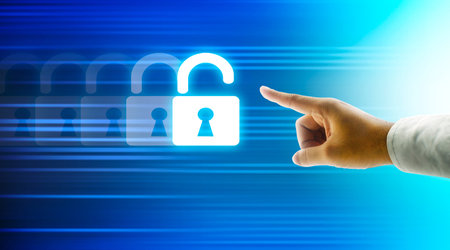 Hand pushing virtual security button on digital background