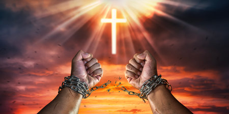 Cross Broken Chains.The concept of gaining freedom.の写真素材