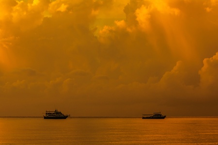 Two small tour boat in oceanの写真素材