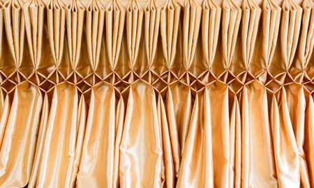 Tablecloth gold on tableの写真素材