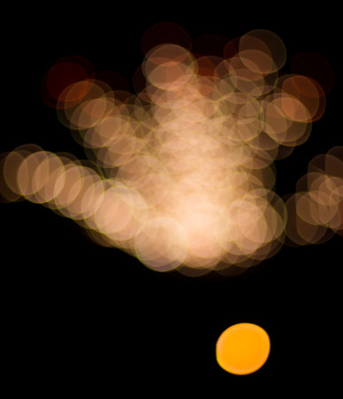 Abstract festive background with bokeh defocused lightsの写真素材