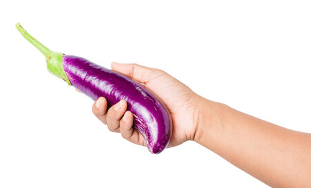 eggplant in hand isolated on whiteの写真素材
