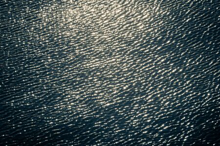 abstract background of water reflect light bokehの写真素材