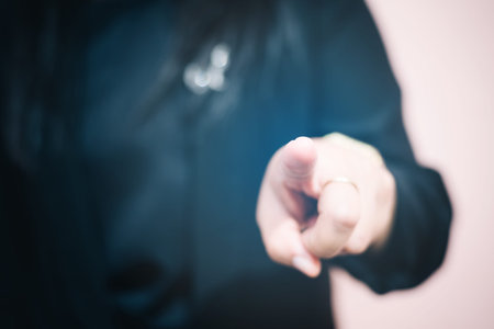 business woman touching the screen with her fingerの写真素材