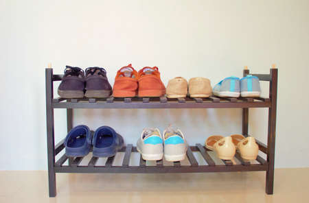Two-layer black wooden shoe rackの写真素材